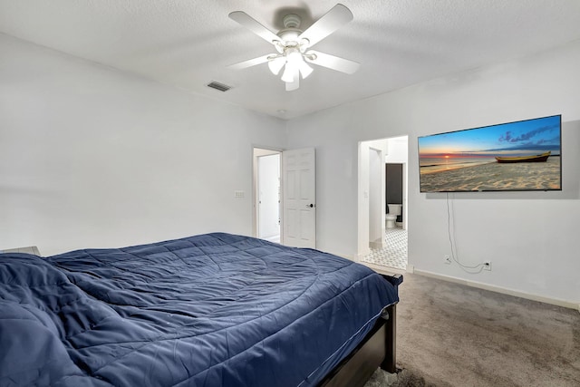 5890 NE 56th Pkwy, Okeechobee, FL 34972 - bedroom with visible vents, baseboards, a ceiling fan, carpet, and a textured ceiling
