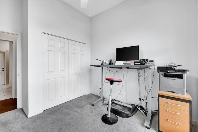 5890 NE 56th Pkwy, Okeechobee, FL 34972 - office area featuring ceiling fan, baseboards, and carpet floors