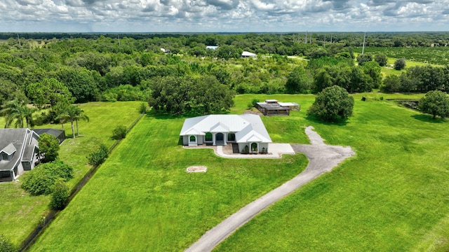 5890 NE 56th Pkwy, Okeechobee, FL 34972 - drone / aerial view featuring a forest view