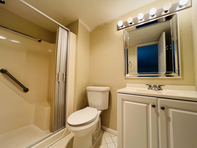 bathroom featuring walk in shower, tile patterned floors, toilet, and vanity