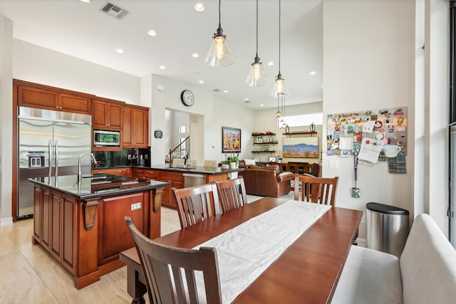 dining space featuring sink