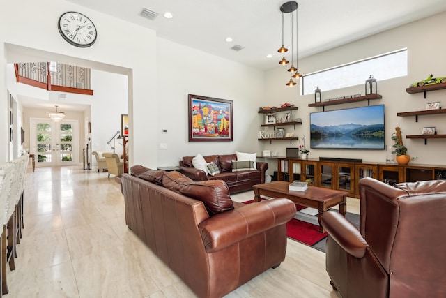 living room with light tile patterned flooring