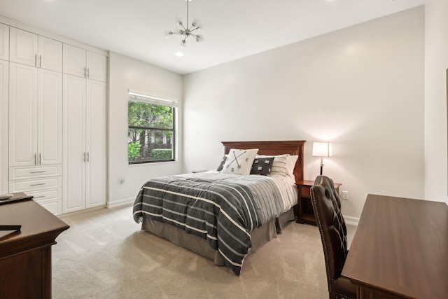 bedroom featuring light carpet