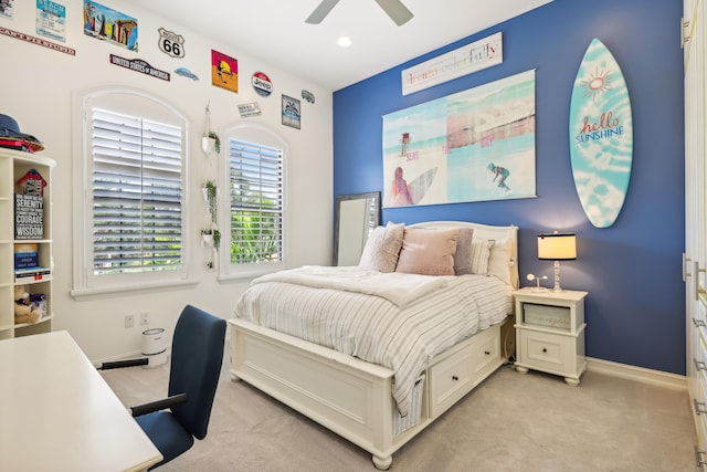 carpeted bedroom featuring ceiling fan