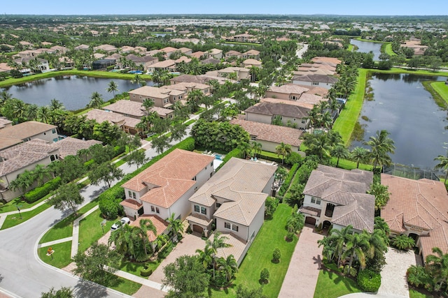 drone / aerial view with a water view