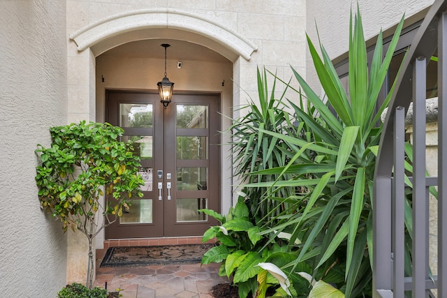 entrance to property featuring french doors