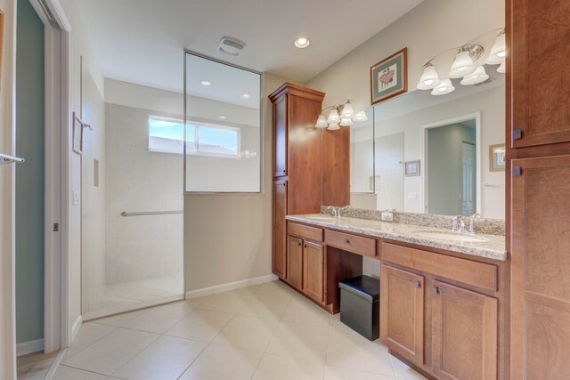 bathroom featuring tile patterned flooring and dual vanity