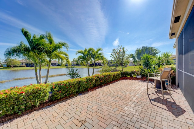 view of patio featuring a water view