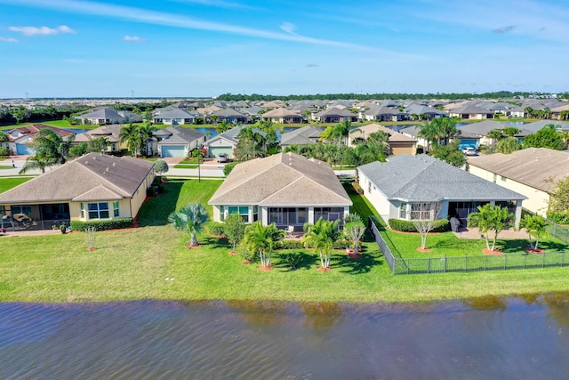 drone / aerial view with a water view