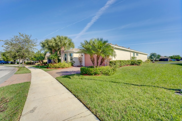 view of front of home with a front lawn