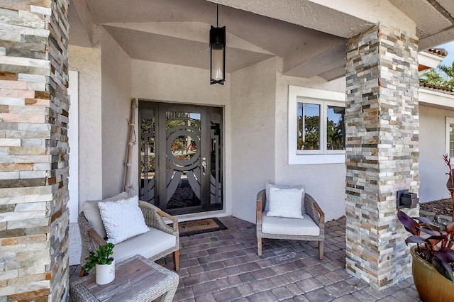 property entrance featuring french doors