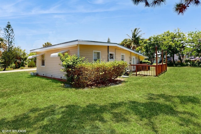 view of home's exterior featuring a lawn