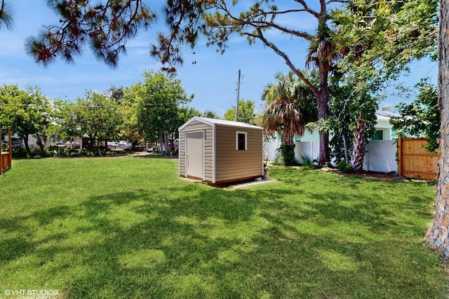 view of yard with a shed