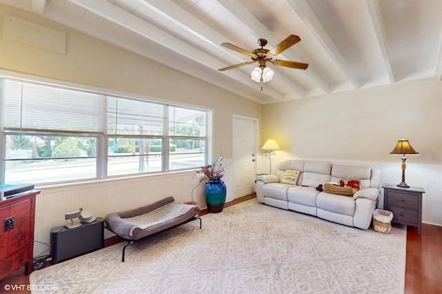 living room featuring ceiling fan, hardwood / wood-style floors, and lofted ceiling with beams