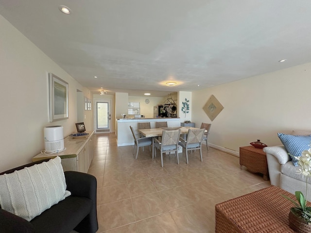 300 NE 26th Ave Unit 114, Boynton Beach, FL 33435 - dining area featuring baseboards, recessed lighting, and light tile patterned flooring