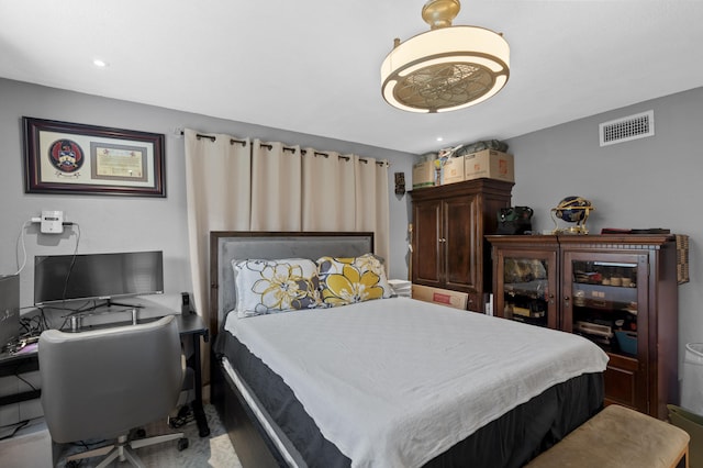 bedroom featuring recessed lighting and visible vents