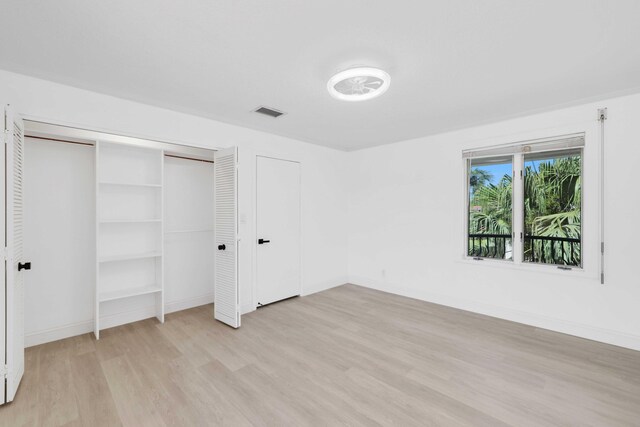 unfurnished bedroom featuring light hardwood / wood-style floors