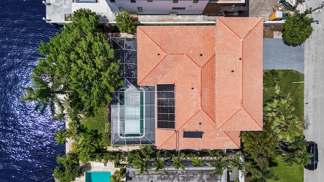 birds eye view of property featuring a water view