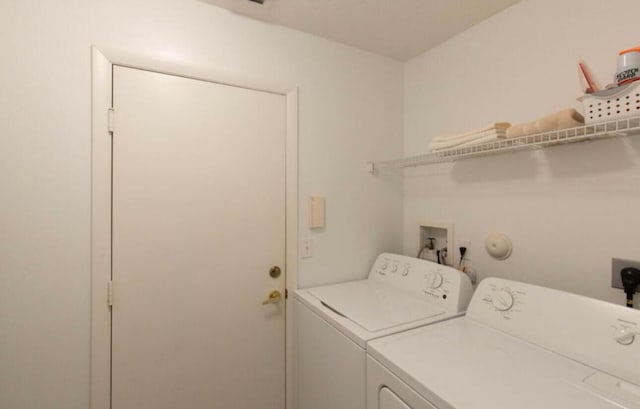 laundry room featuring washer and dryer