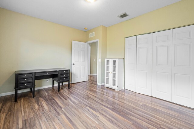 empty room featuring hardwood / wood-style floors