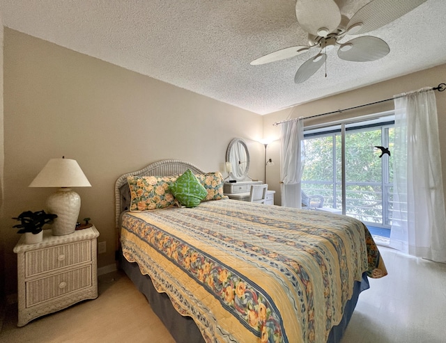 bedroom featuring a textured ceiling and ceiling fan