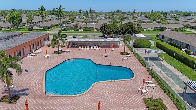 view of swimming pool featuring a patio area