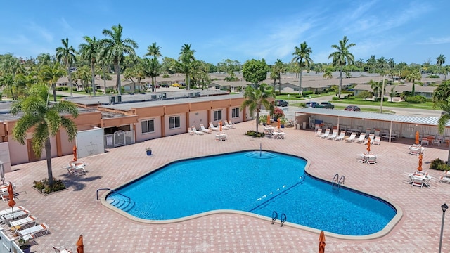 view of swimming pool featuring a patio area