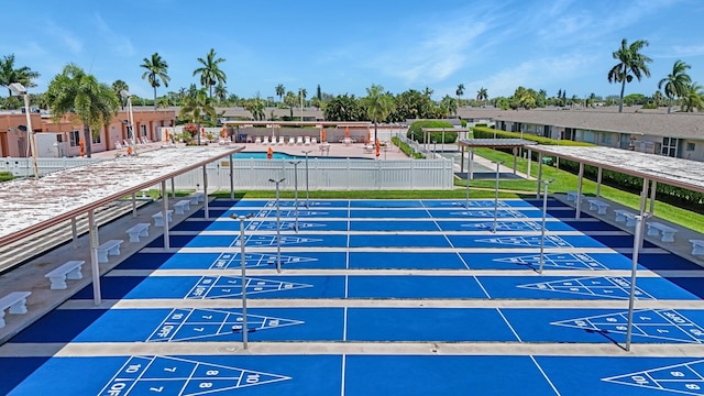 view of home's community featuring a swimming pool