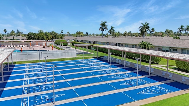 view of home's community featuring a pool