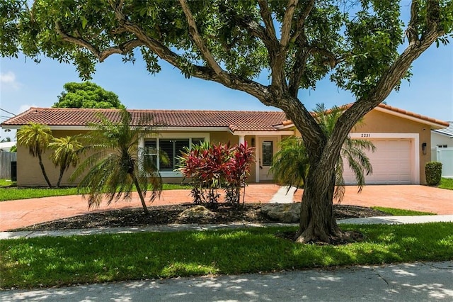 view of front of home with a garage