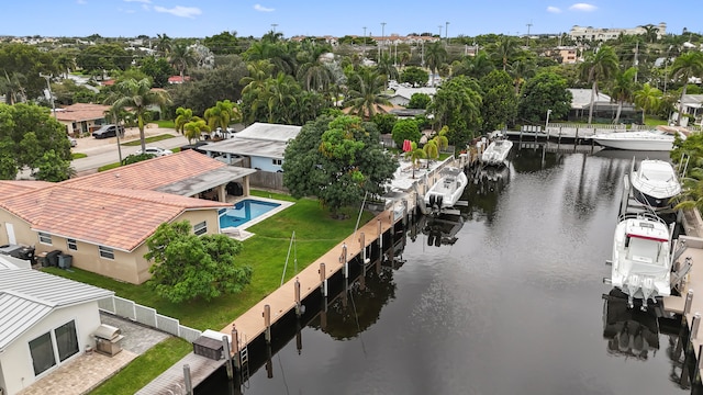 drone / aerial view with a water view