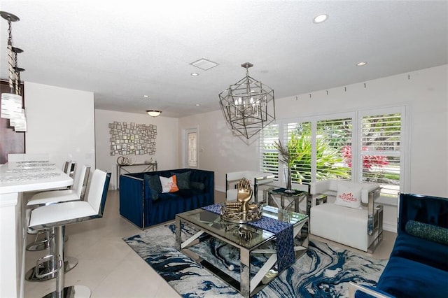 living room with a notable chandelier