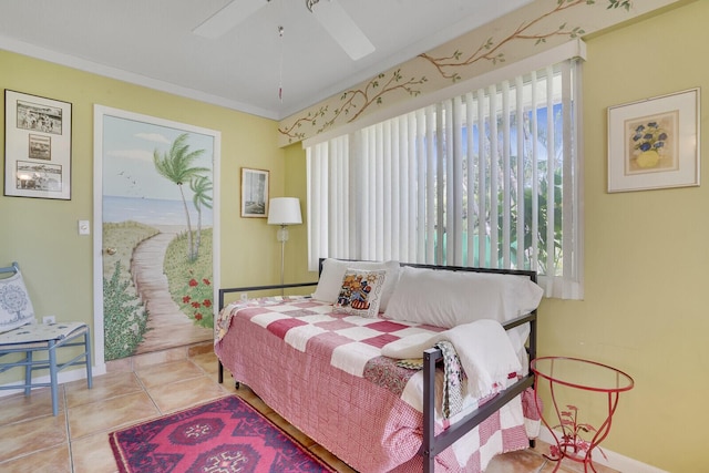 tiled bedroom featuring crown molding and ceiling fan