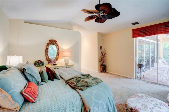 carpeted bedroom with access to exterior, ceiling fan, and lofted ceiling