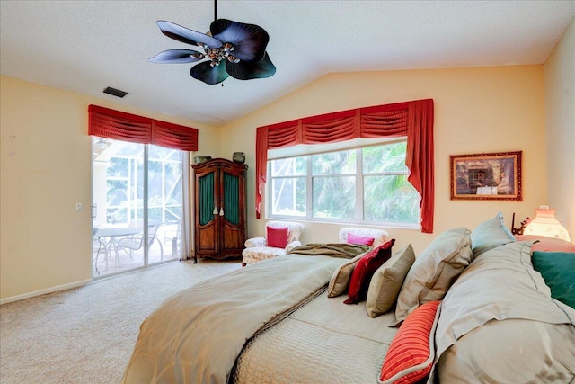 bedroom featuring carpet floors, access to exterior, a textured ceiling, lofted ceiling, and ceiling fan