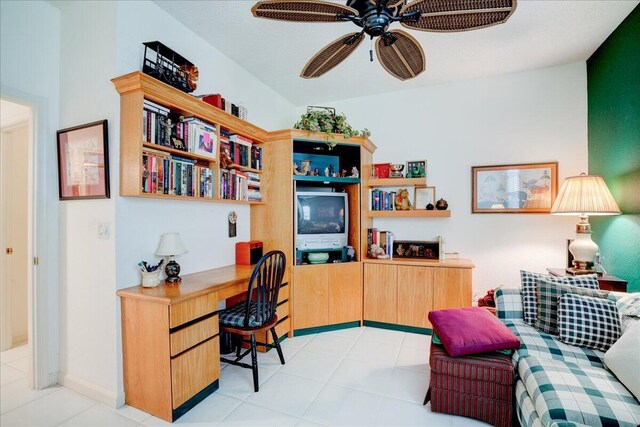 tiled office space with ceiling fan