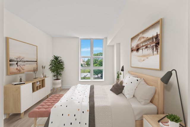 bedroom featuring light wood-type flooring