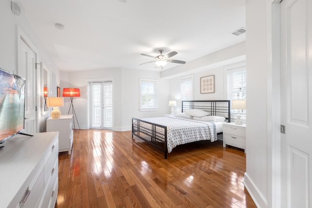 bedroom featuring ceiling fan and wood-type flooring