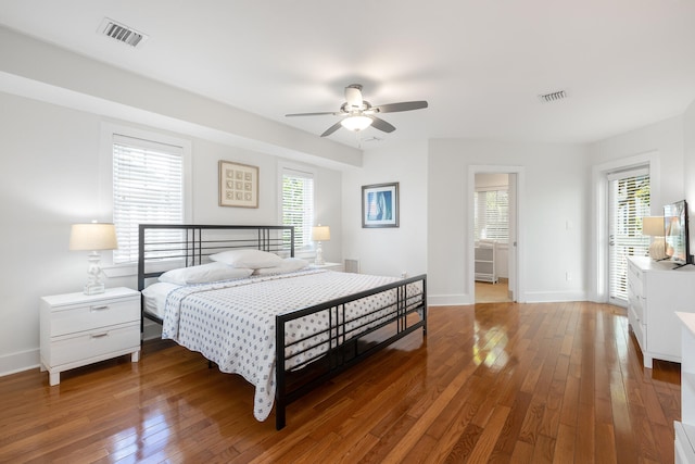 bedroom with ceiling fan and hardwood / wood-style flooring