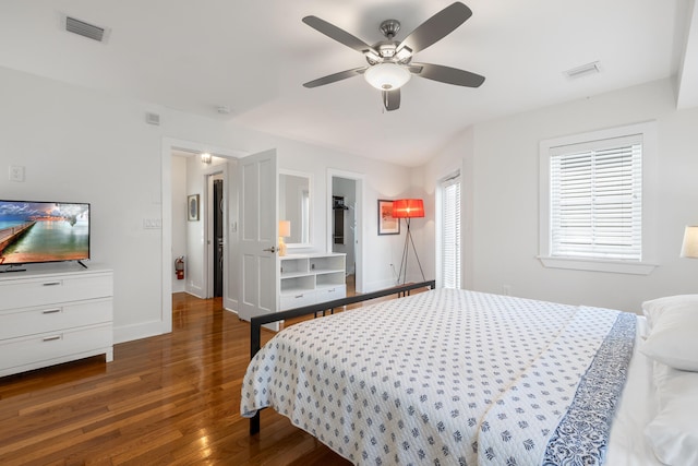 bedroom featuring hardwood / wood-style flooring and ceiling fan