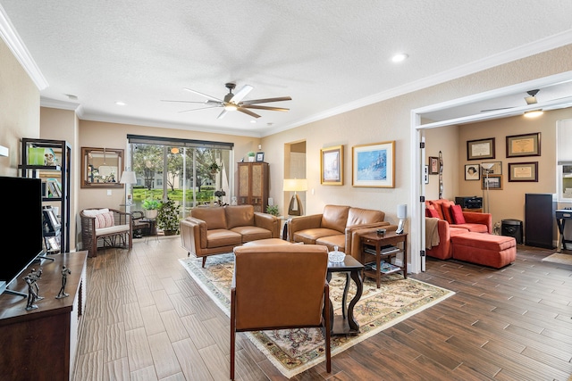 7869 Laina Ln Unit 2, Boynton Beach, FL 33437 - living room with ceiling fan, a textured ceiling, dark wood-type flooring, crown molding, and recessed lighting