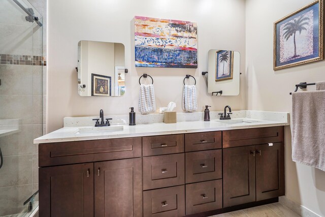 7869 Laina Ln Unit 2, Boynton Beach, FL 33437 - bathroom featuring double vanity and a tile shower