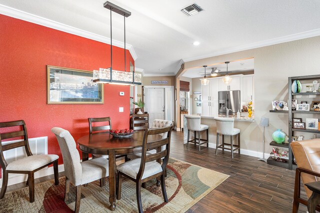7869 Laina Ln Unit 2, Boynton Beach, FL 33437 - dining space featuring ornamental molding, dark wood-style flooring, baseboards, and recessed lighting