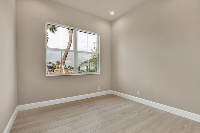 unfurnished room featuring light wood-type flooring