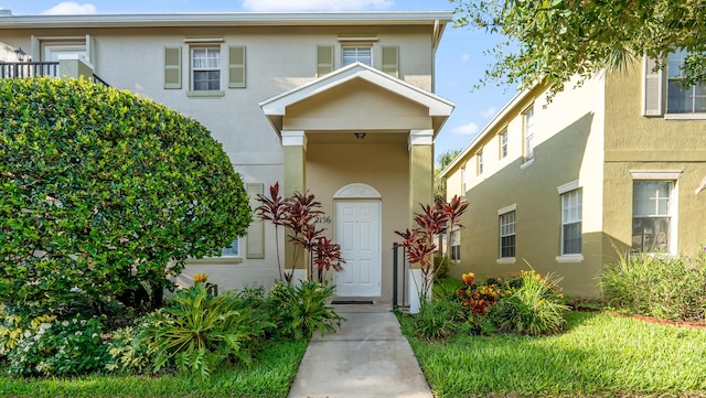 2156 SE Eatonville Dr, Port Saint Lucie, FL 34952 - view of front of house featuring stucco siding
