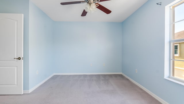2156 SE Eatonville Dr, Port Saint Lucie, FL 34952 - carpeted spare room with baseboards and a ceiling fan
