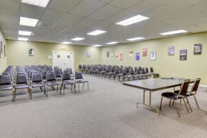 interior space featuring a drop ceiling