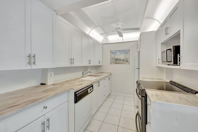 kitchen featuring white cabinetry, light tile patterned flooring, ceiling fan, range with electric stovetop, and dishwasher