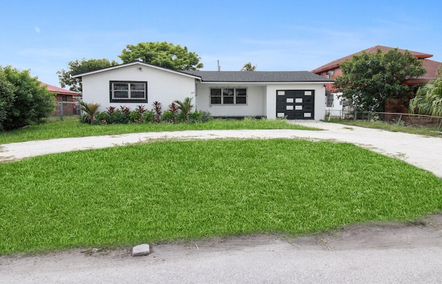 view of front facade with a front lawn