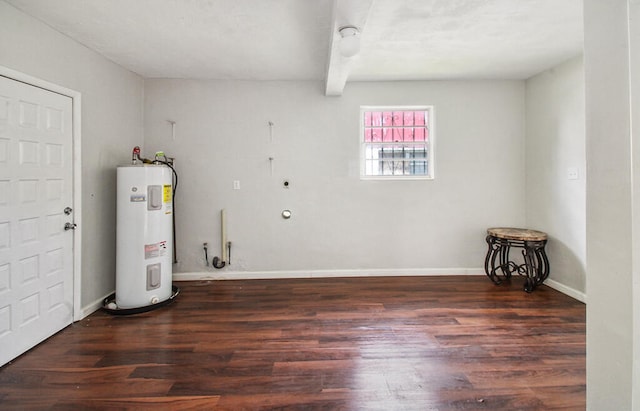 washroom featuring electric dryer hookup, hardwood / wood-style floors, and water heater